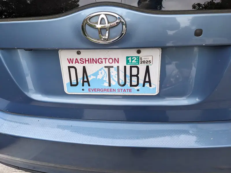 A license plate that reads "DA TUBA"